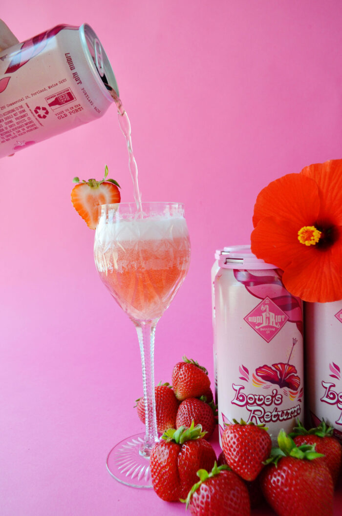 Pouring a can of Love's Return our rosé beer